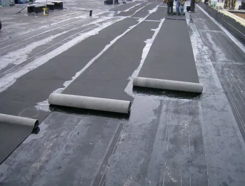 Modified Bitumen Roofing Being Installed